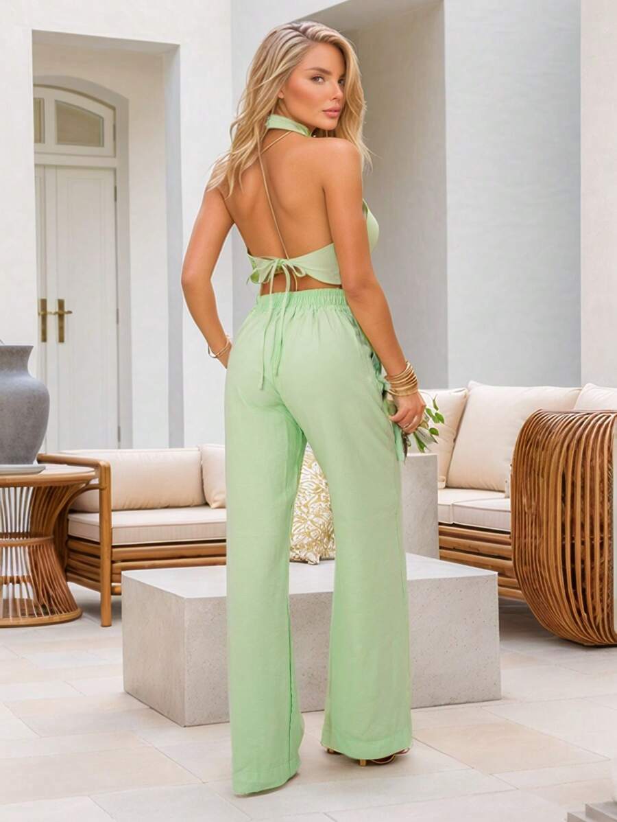 Conjunto Feminino Cropped Com Bojo E Calça Com Ilhós E Zíper Frontal