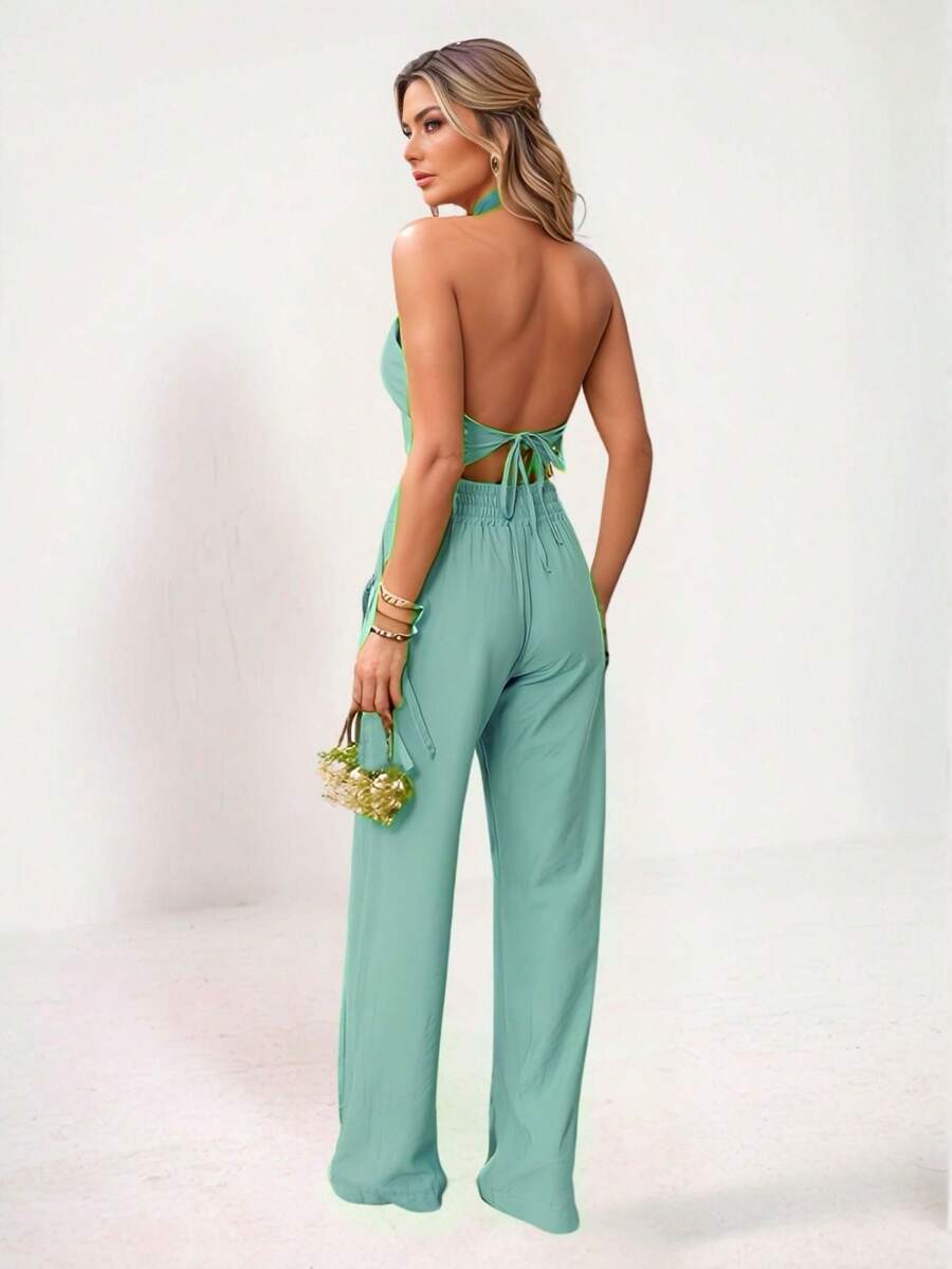 Conjunto Feminino Cropped Com Bojo E Calça Com Ilhós E Zíper Frontal